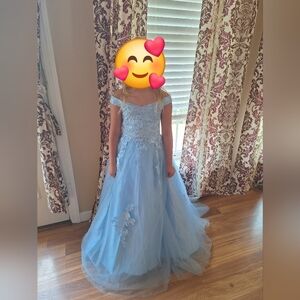 Elegant Girl Blue Gown with Floral Details